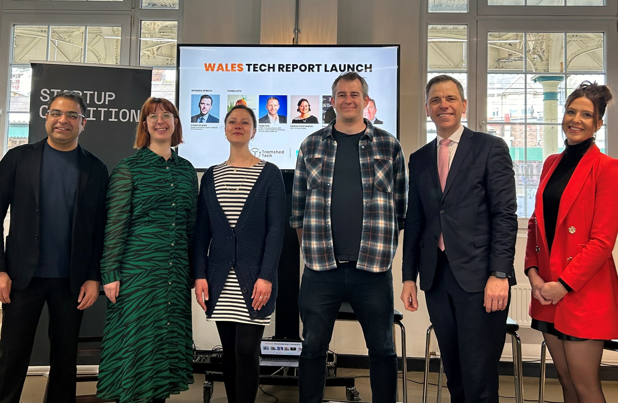 Chris Evans MP stands with a group of tech founders and start-up sector experts.